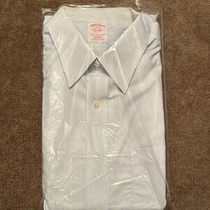 Never worn brooks brothers dress shirt. 18-34. Traditional fit.